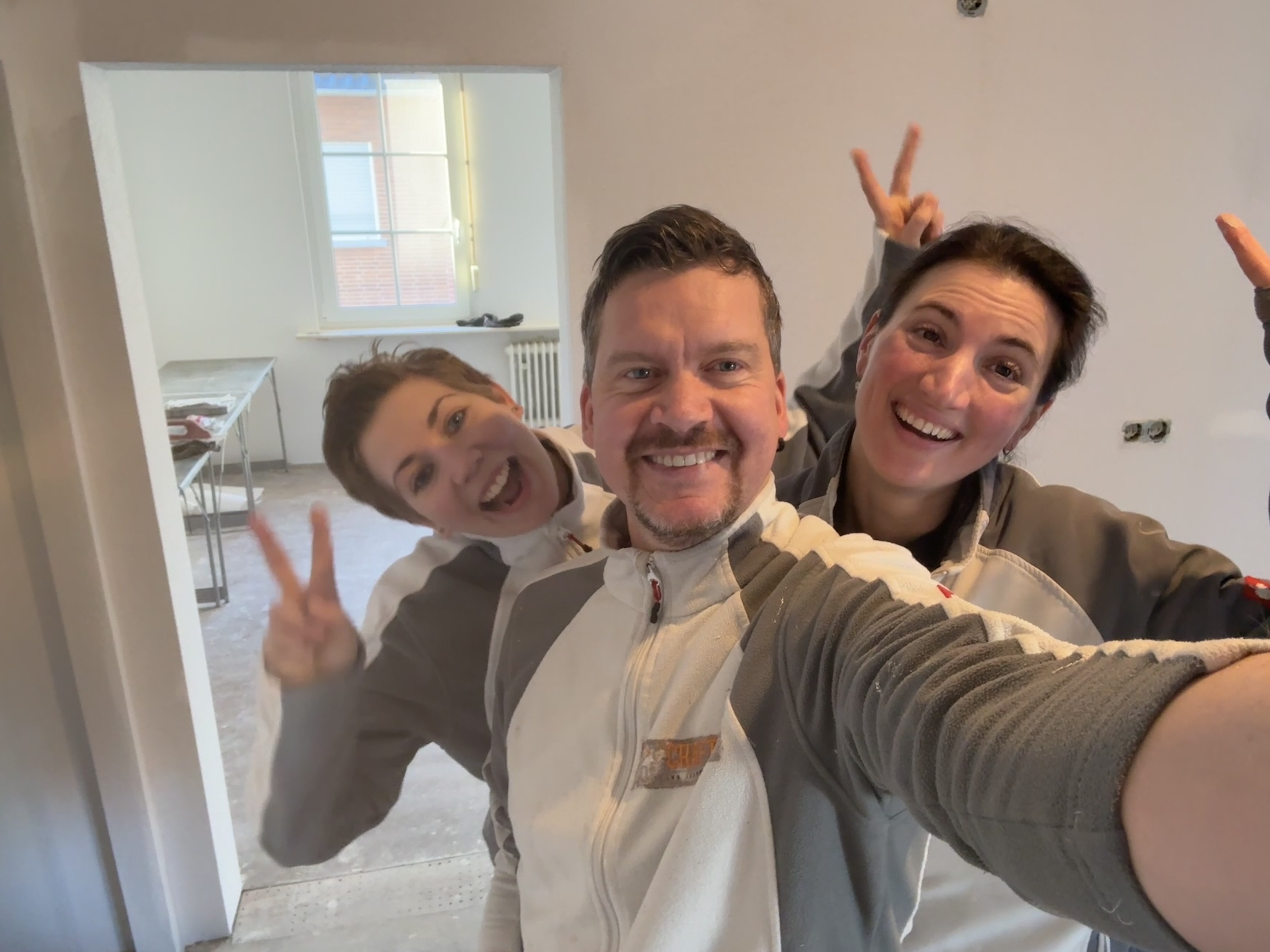 Craftsman-Team nach Renovierungsarbeiten